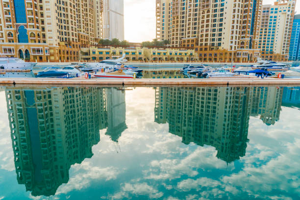 Crystal-clear swimming pool with blue water reflecting sunlight.