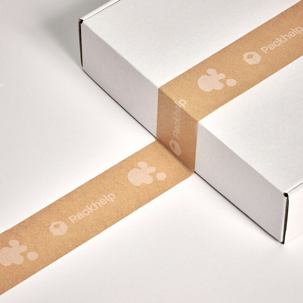 Glossy apparel boxes stacked neatly on a retail shelf with branding
