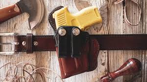 Integrating Technology into manufacturing of leather holsters. Manufacturing of Leather Holsters