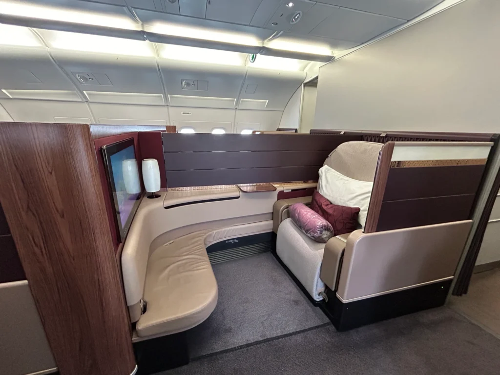 how much does first class cost in qatar airways