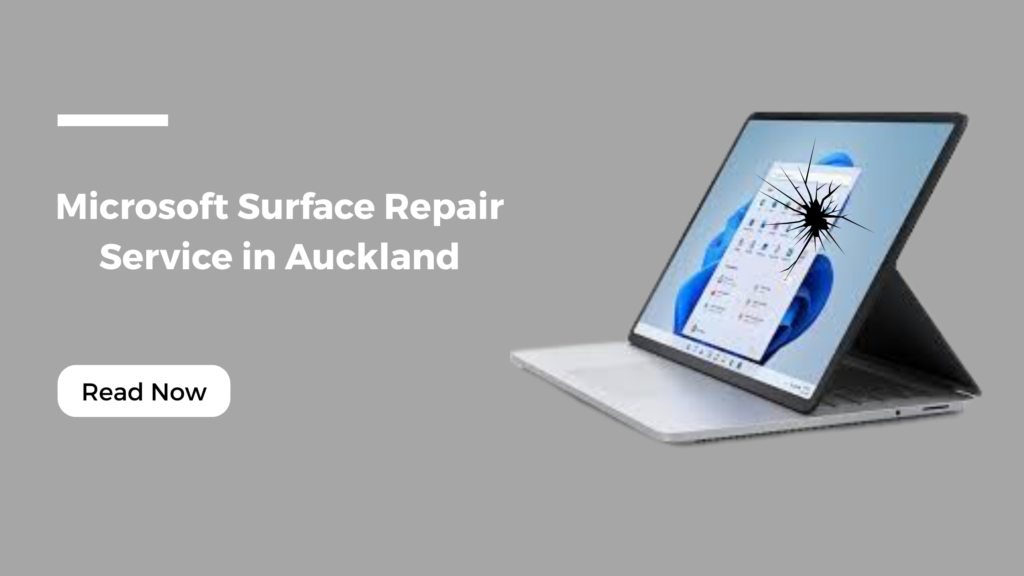 A Microsoft Surface Pro laptop with a cracked screen displayed on a grey background, promoting expert Microsoft Surface Repair Service in Auckland by Smashed IT.