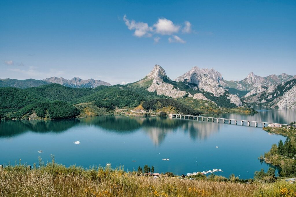 landscape, lake, mountains, bridge, nature, reflection, clouds, blue sky, hiking, recreation, tourism, calm, water, scenic, summer-10122557.jpg